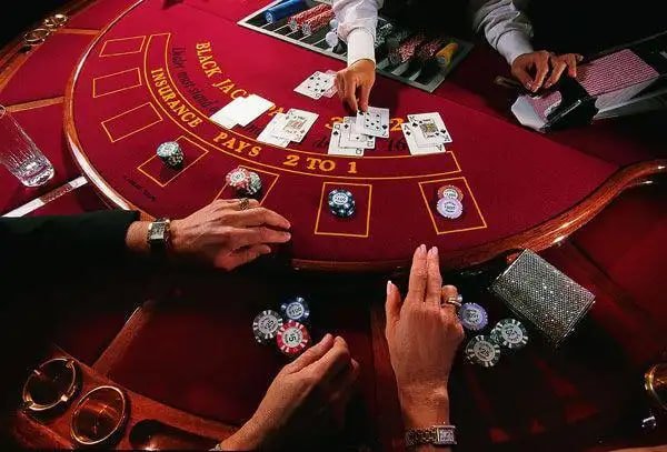Filipino sports fans watching basketball and placing bets on jlboss apk betting platform